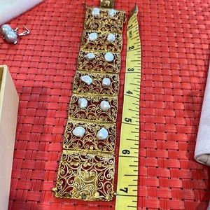 Magnificent gold finish bracelet w ith mother of pearls